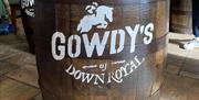 Image is of a beer barrel with the name Gowdy's of Down Royal on the front