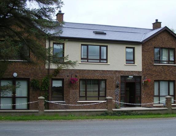 Shows image of the front of Down Royal House