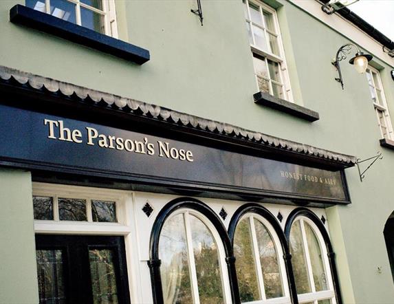 Image is of the front of the restaurant showing its name