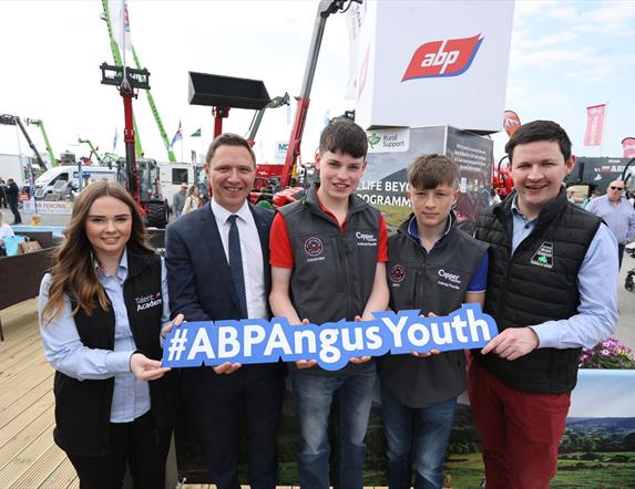 Group holding a sign saying #ABPAngusYouth
