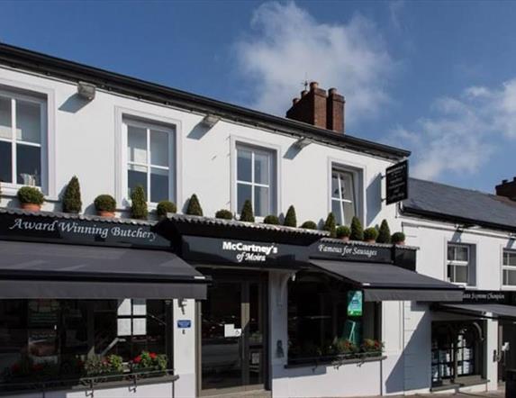 Image is of shop front facing out onto street