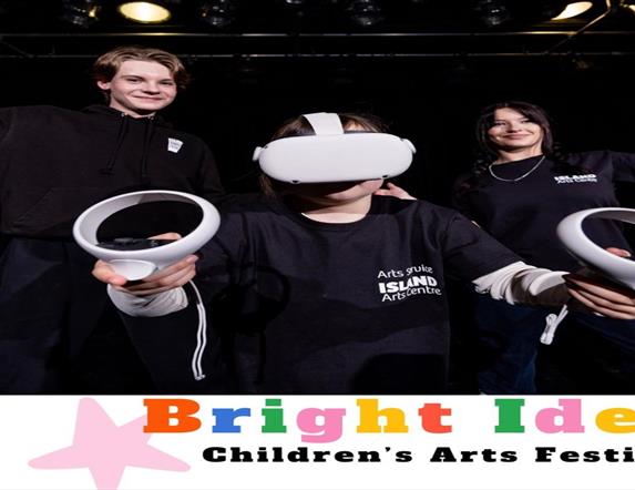 3 Members of Bright Ideas Children's Art Festival using Gaming head set.