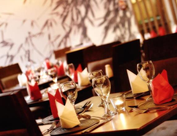 Image is of table laid for dinner