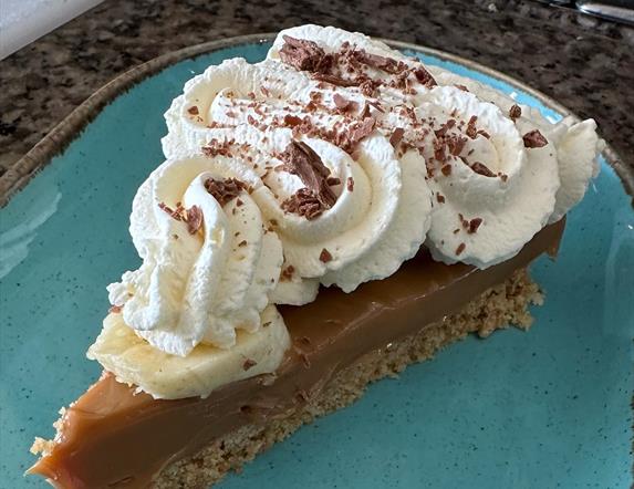 Image is of a slice of cake from Froth cafe