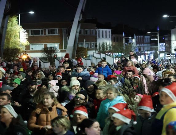 Image is crowd of people at the Lisburn Switch on Christmas event
