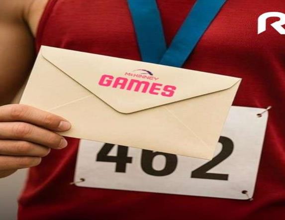 Image is of a runner holding an envelope saying McKinney Games on the front