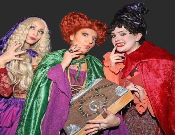 Image shows the Sanderson Sisters dressed in Halloween Costume
