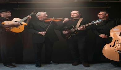 Group of musicans on stage