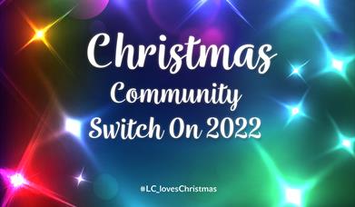 A Poster image with brightly coloured lights with words in centre 'Christmas Community Switch On 2022