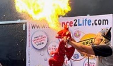 Dragon breathing fire on stage