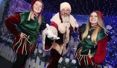Picture of Santa with two elves