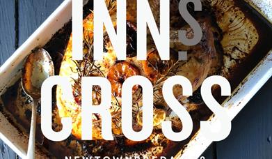 An image of the Inns Cross in words across an image of food