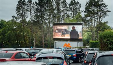 Cars at drive-in cinema at Let's Go Hydro
