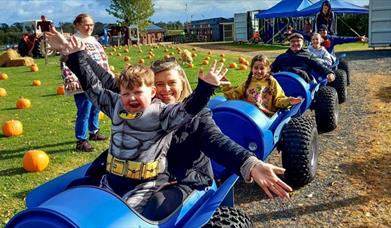 Image is of family at the Pumpkin Patch at Moira Lakes