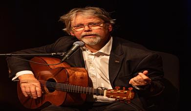 Image is of singer songwriter Anthony Toner