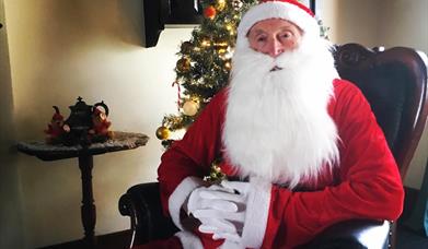 Image is of Santa Claus at The Ballance House