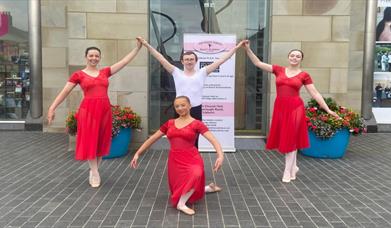 Image shows 4 members of The Wendy Gibson Ballet Academy at the front of the Lisburn Visitor Information Centre, Market Square Lisburn.