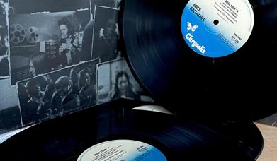 2 vinyl records with images of Rory Gallagher