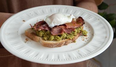 An image of Bacon, egg and avocado on toast
