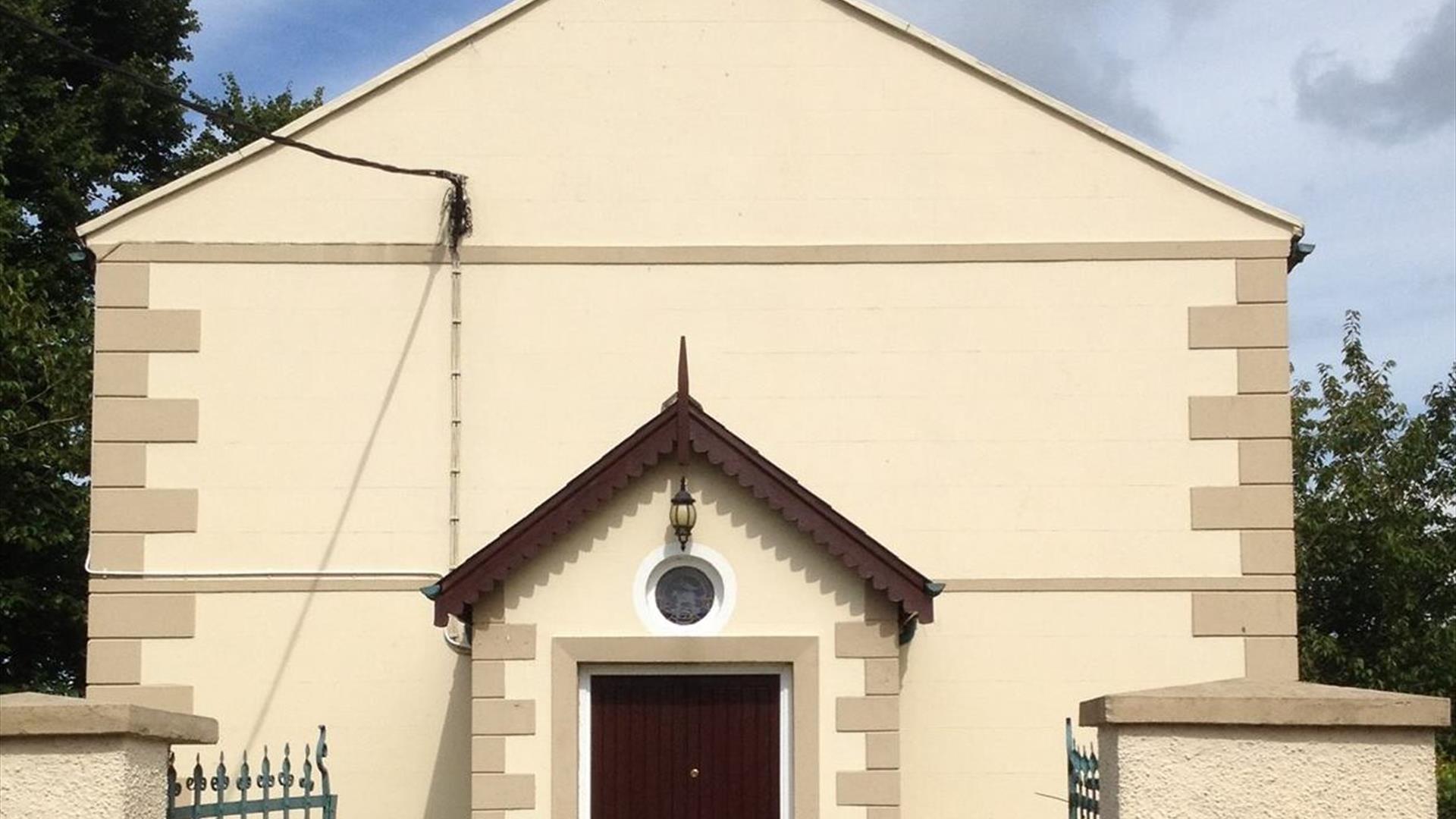 Outside image of the church showing gateway