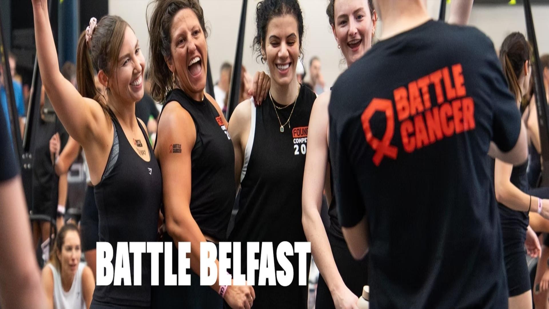 Image shows participants in black Battle Cancer tshirts at event.