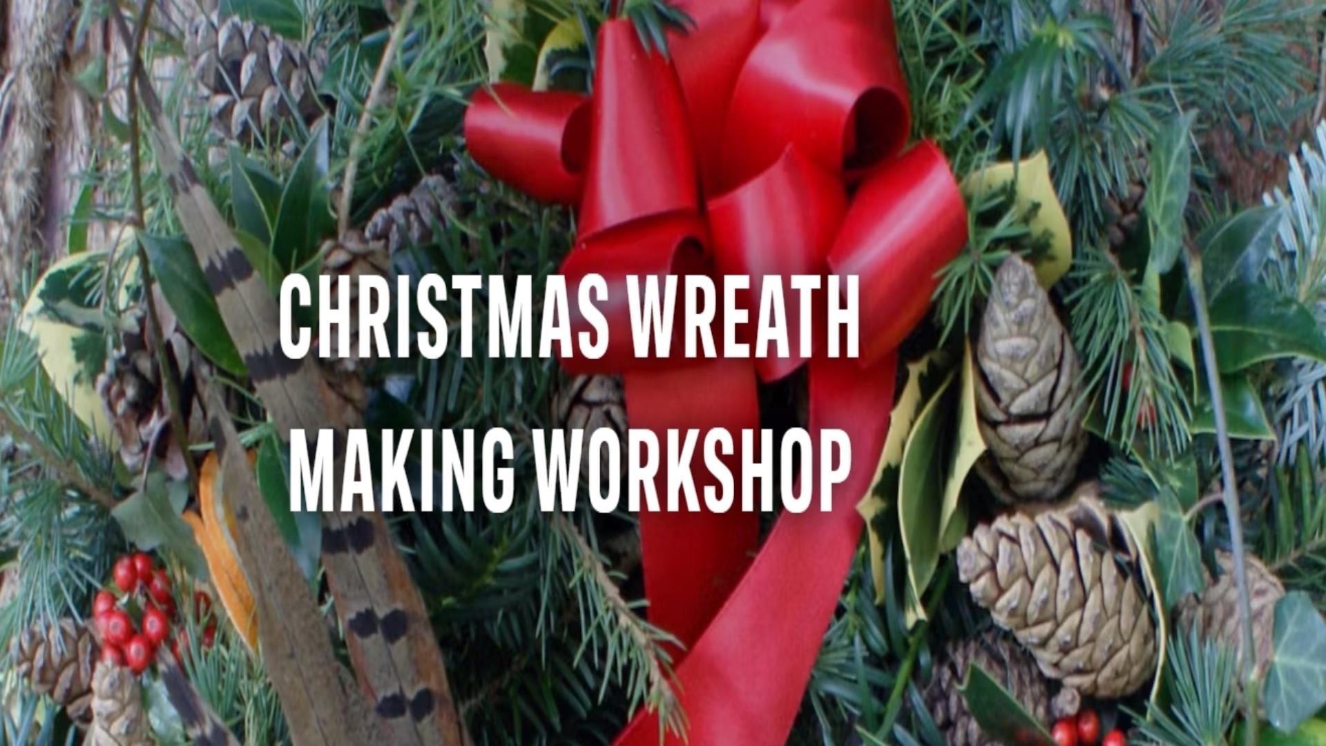Image shows Christmas Wreath with red ribbon and berries.