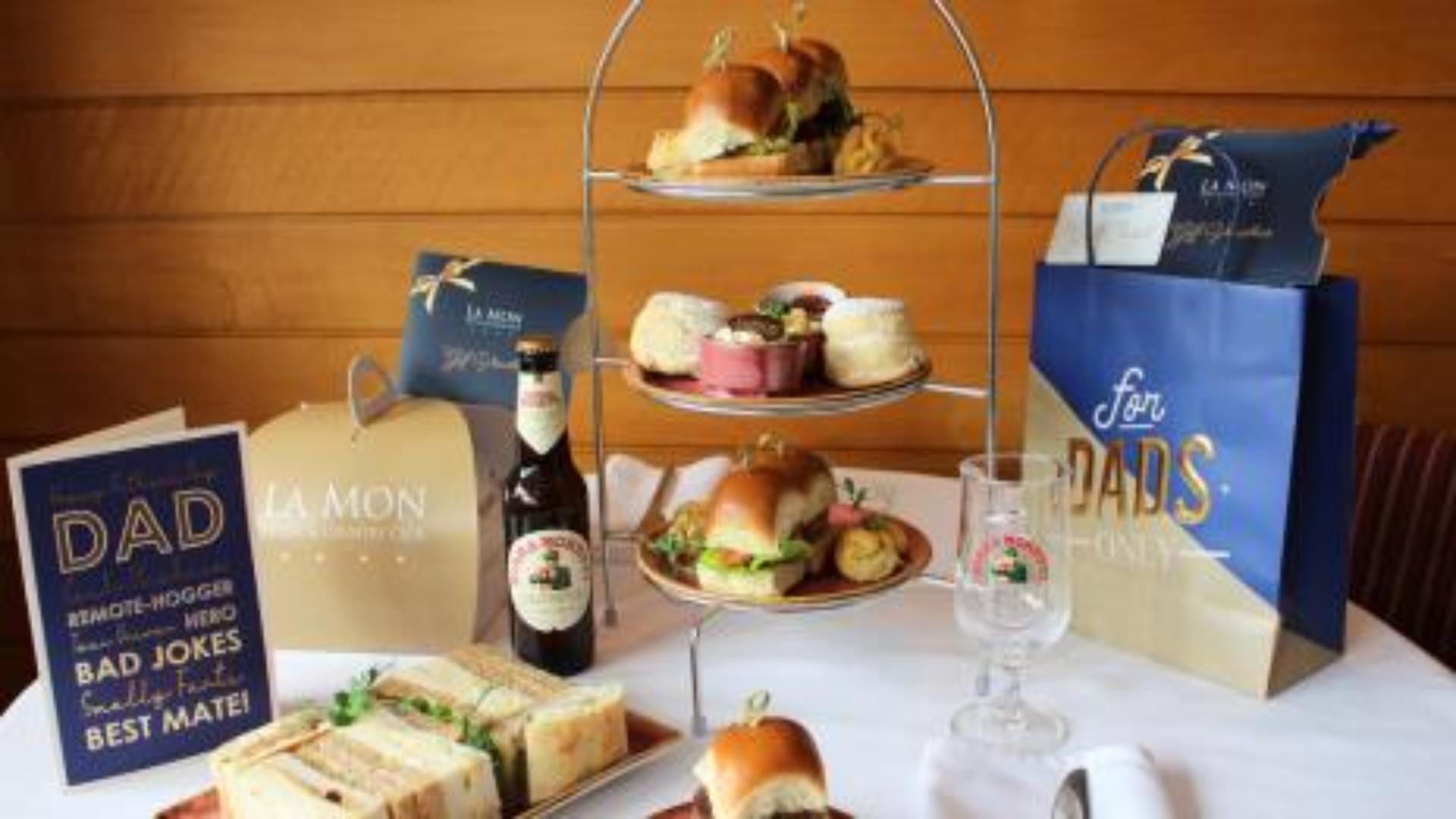 Image shows afternoon tea and bottle of beer.