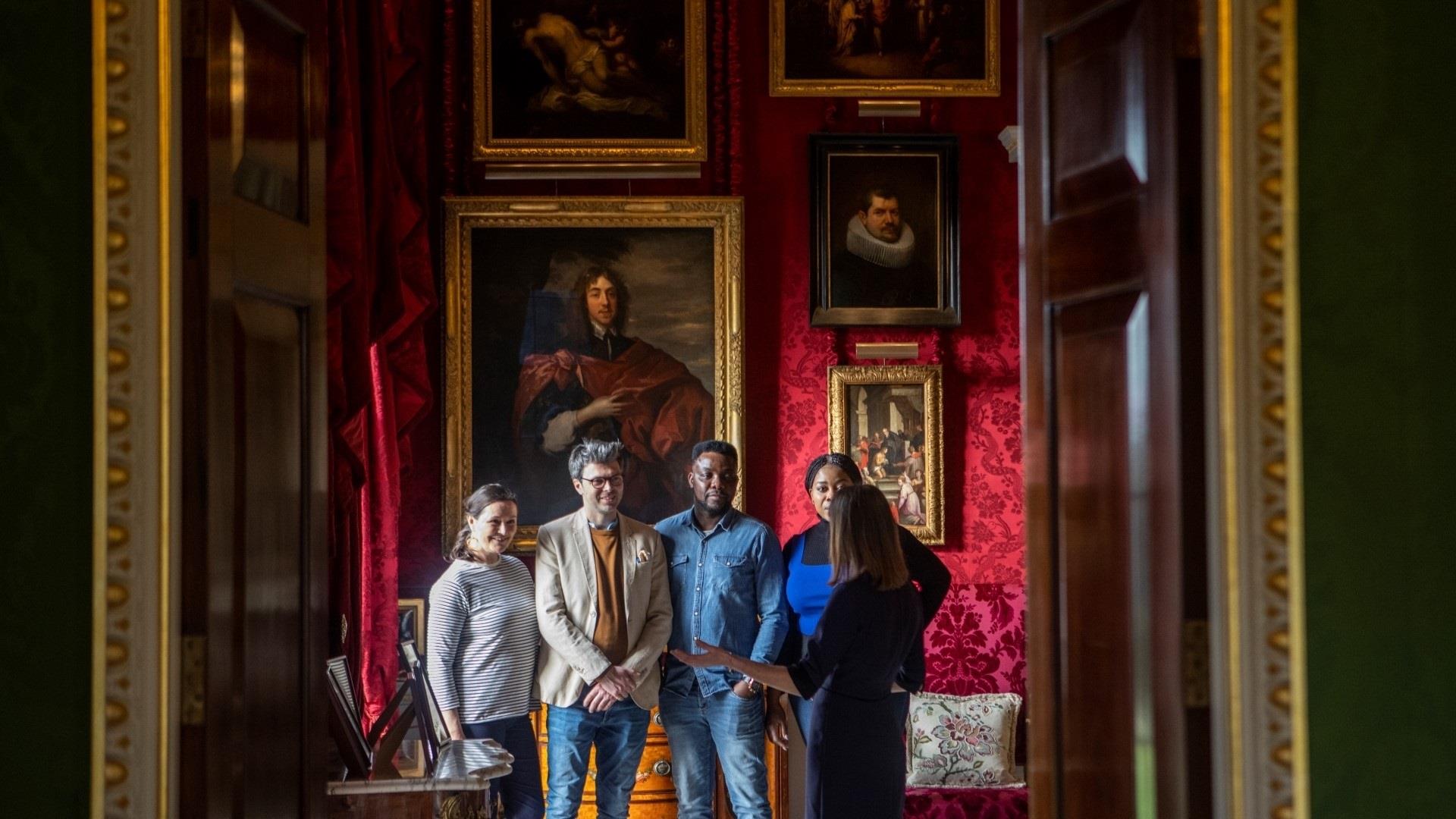 Image shows a group of visitors on a tour of Hillsborough Castle Art.