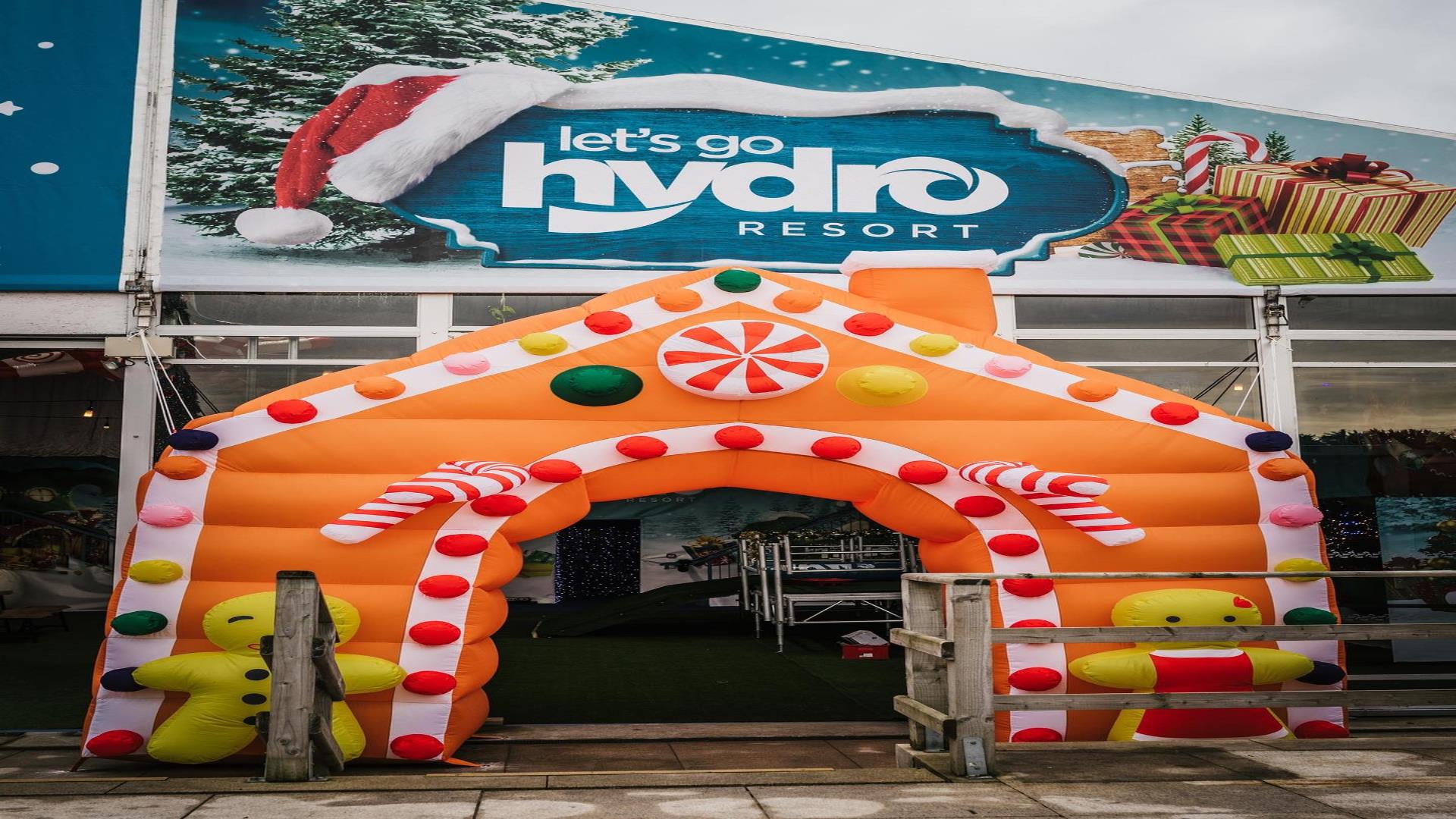 Image is of an inflatable decorated for Christmas