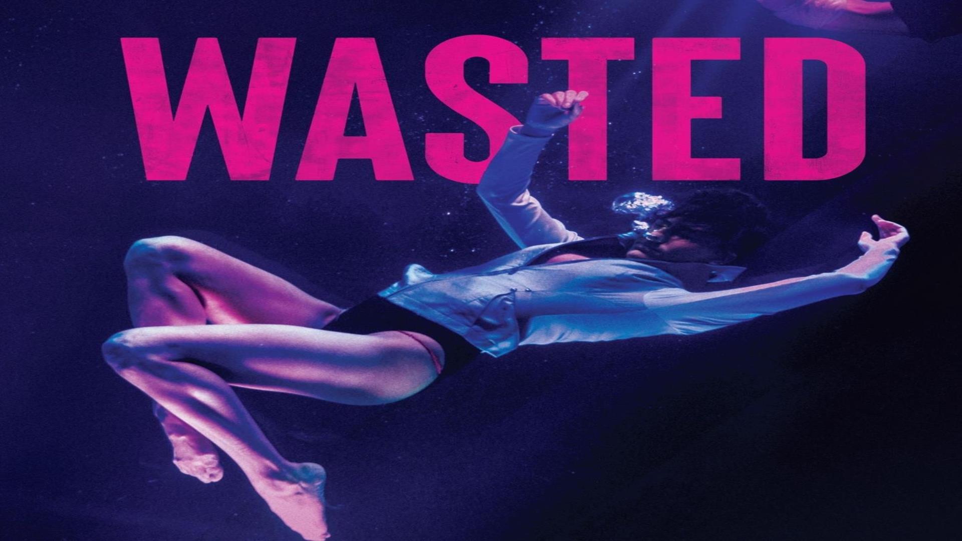 Image is of a person suspended in mid air with the word wasted above them