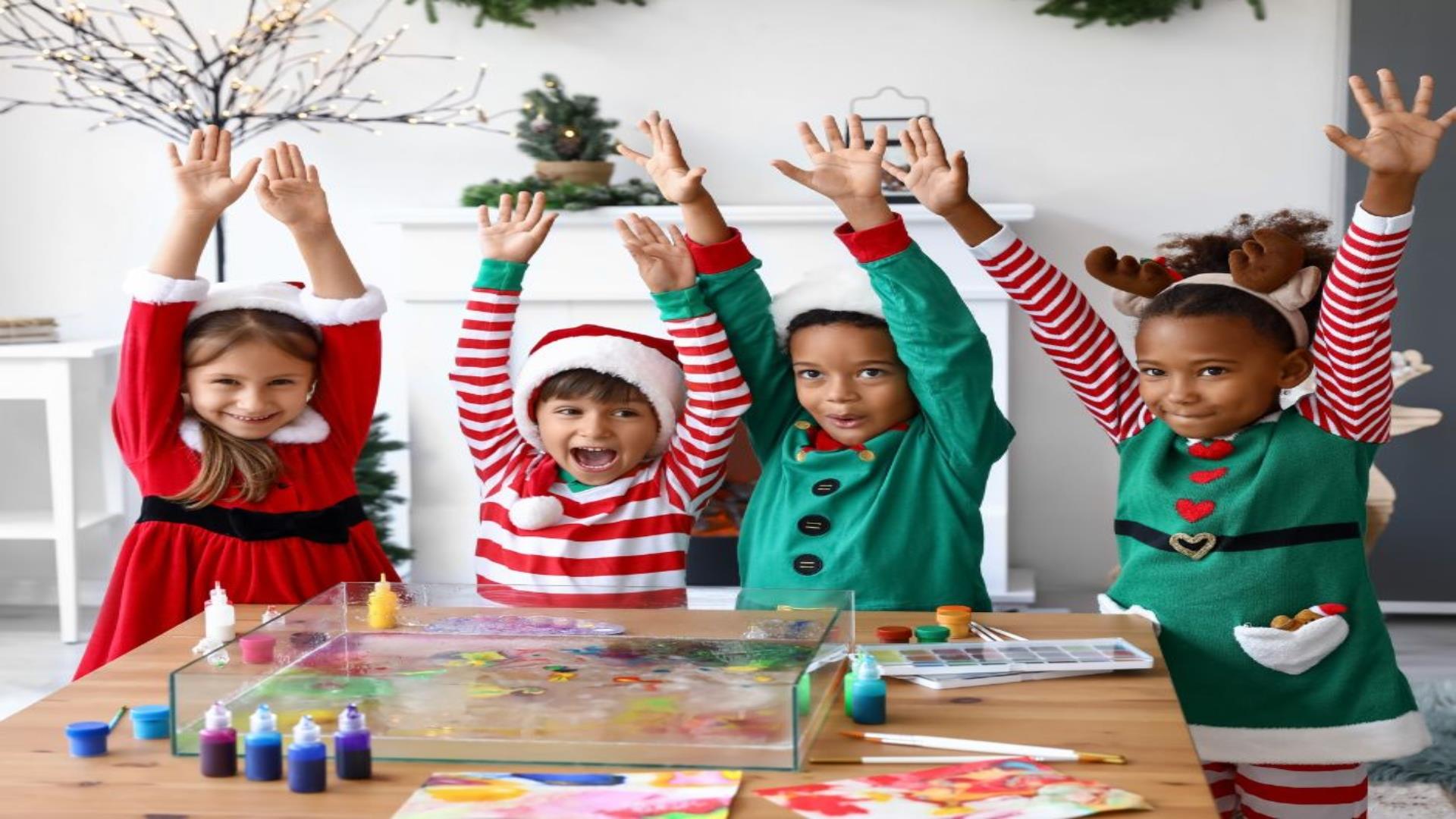 Image is of children dressed in Christmas outfits