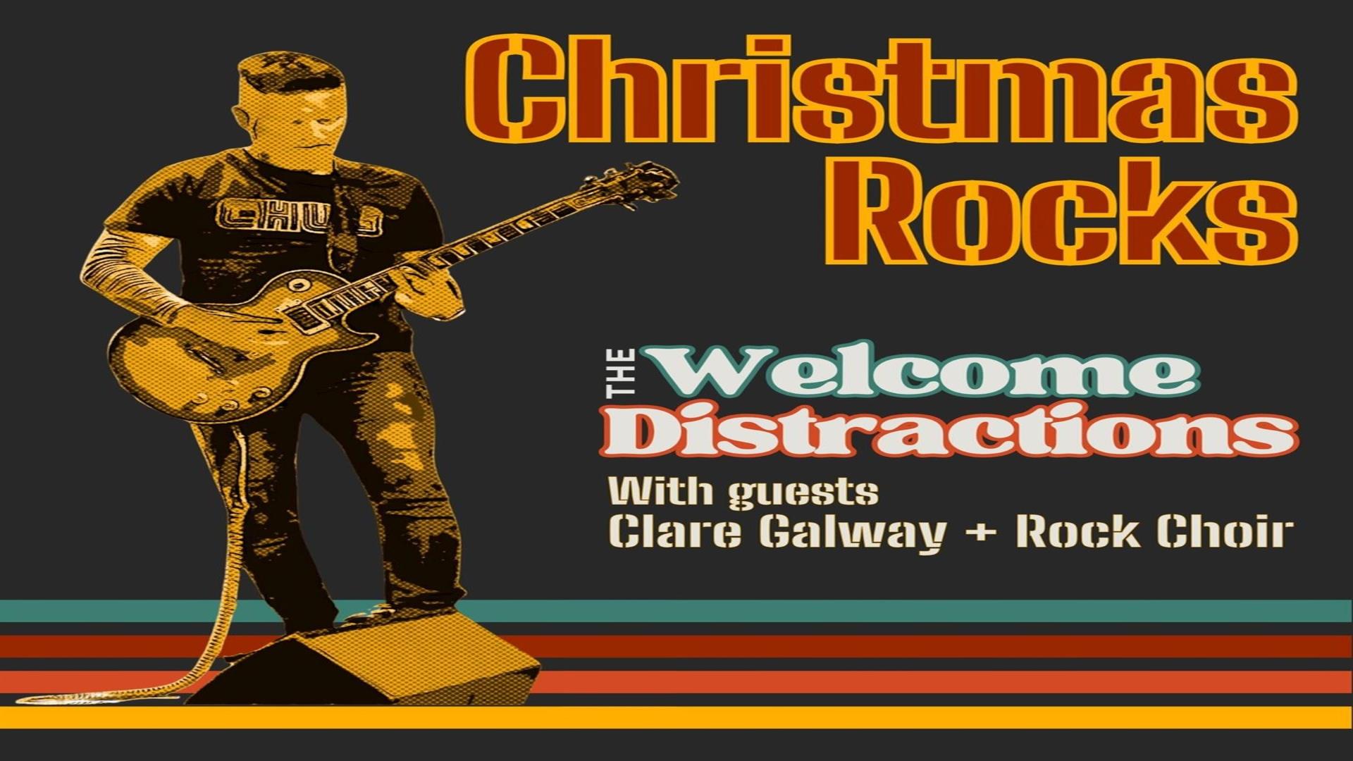 Image is of musician playing an electric guitar on stage