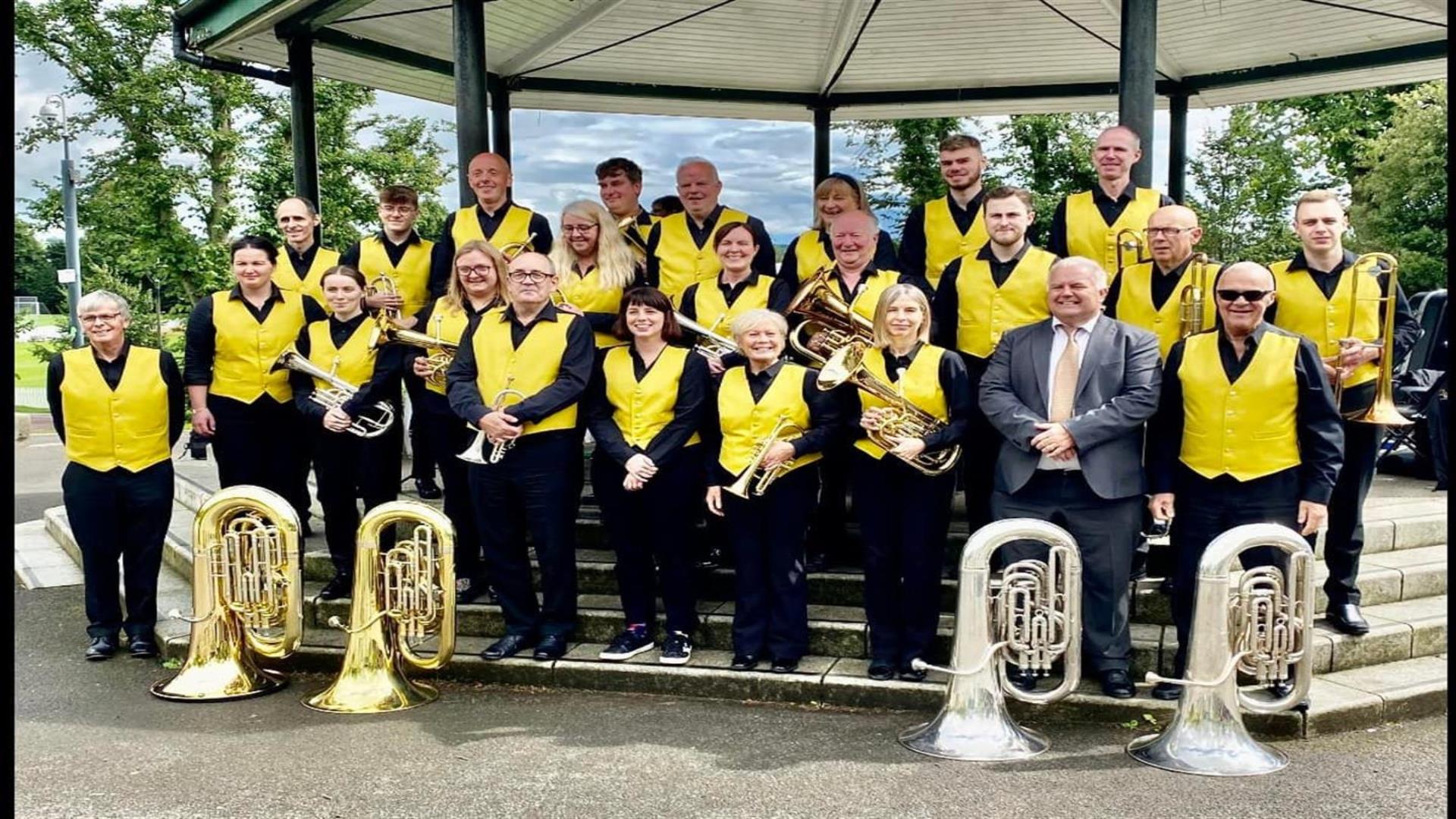 Image is of musicians in Dynamic Brass