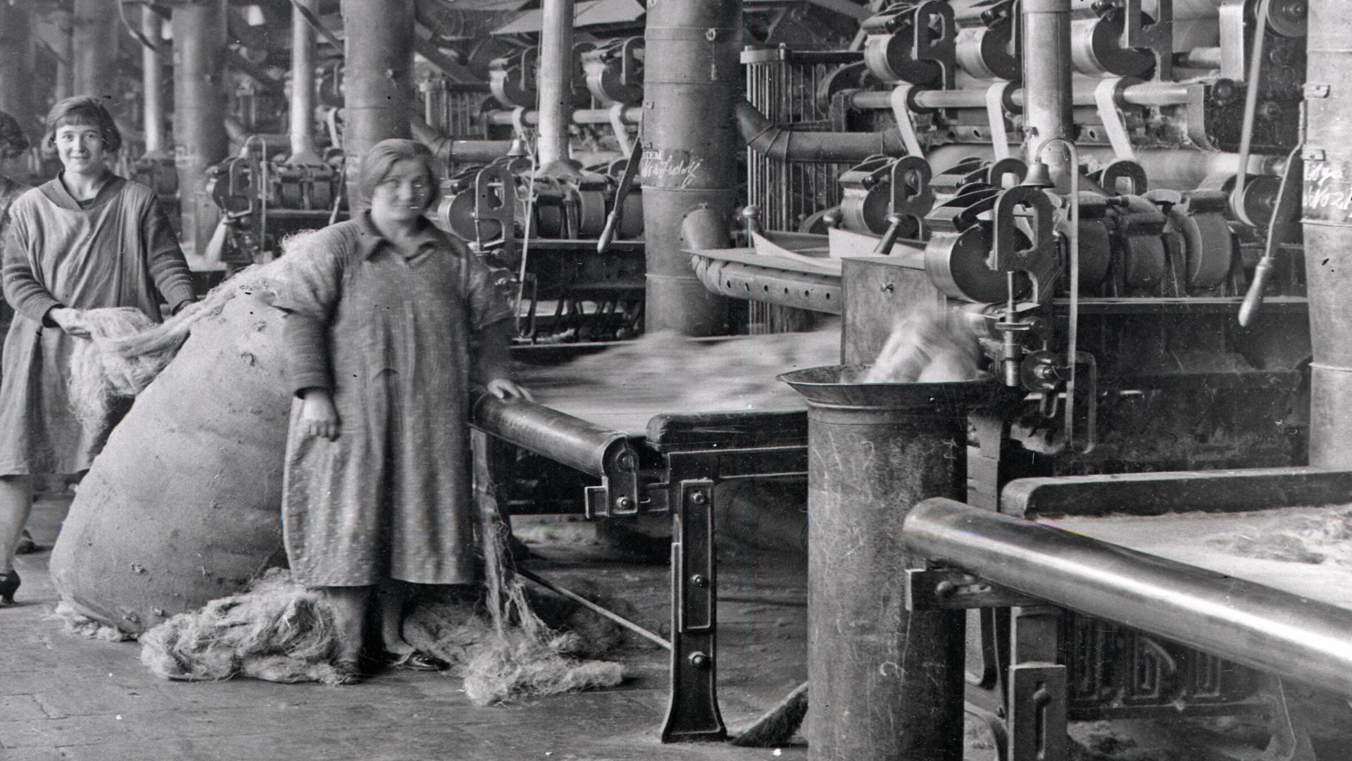 Image is black and white photograph of women working in the Belfast Mills