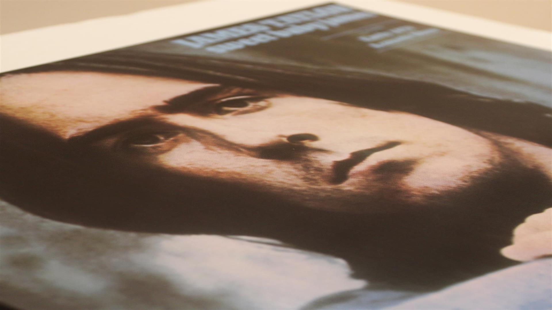 Image is the album cover of James Taylor album Sweet Baby James