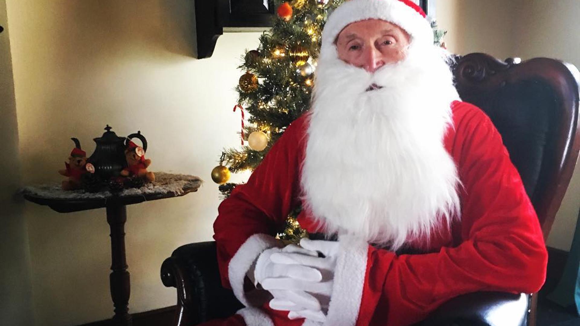 Image is of Santa Claus at The Ballance House