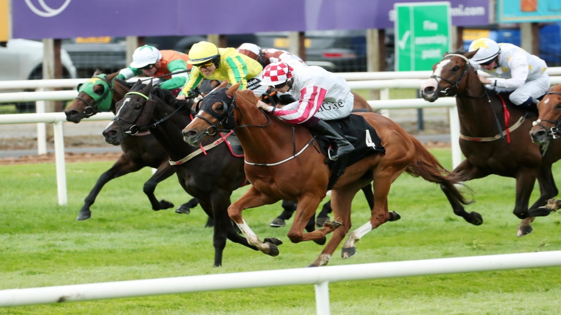 Image is of horse racing