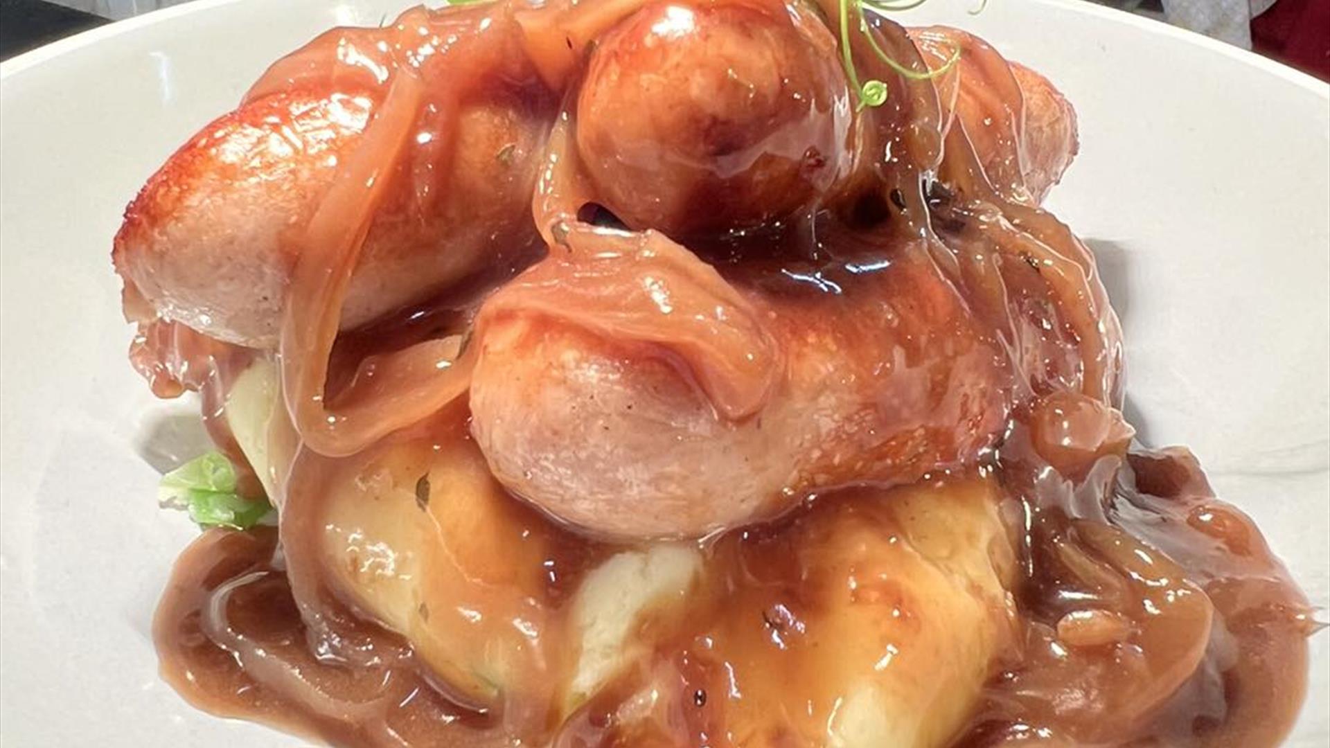 Image is a plate of food about to be served at The Drumlins Restaurant