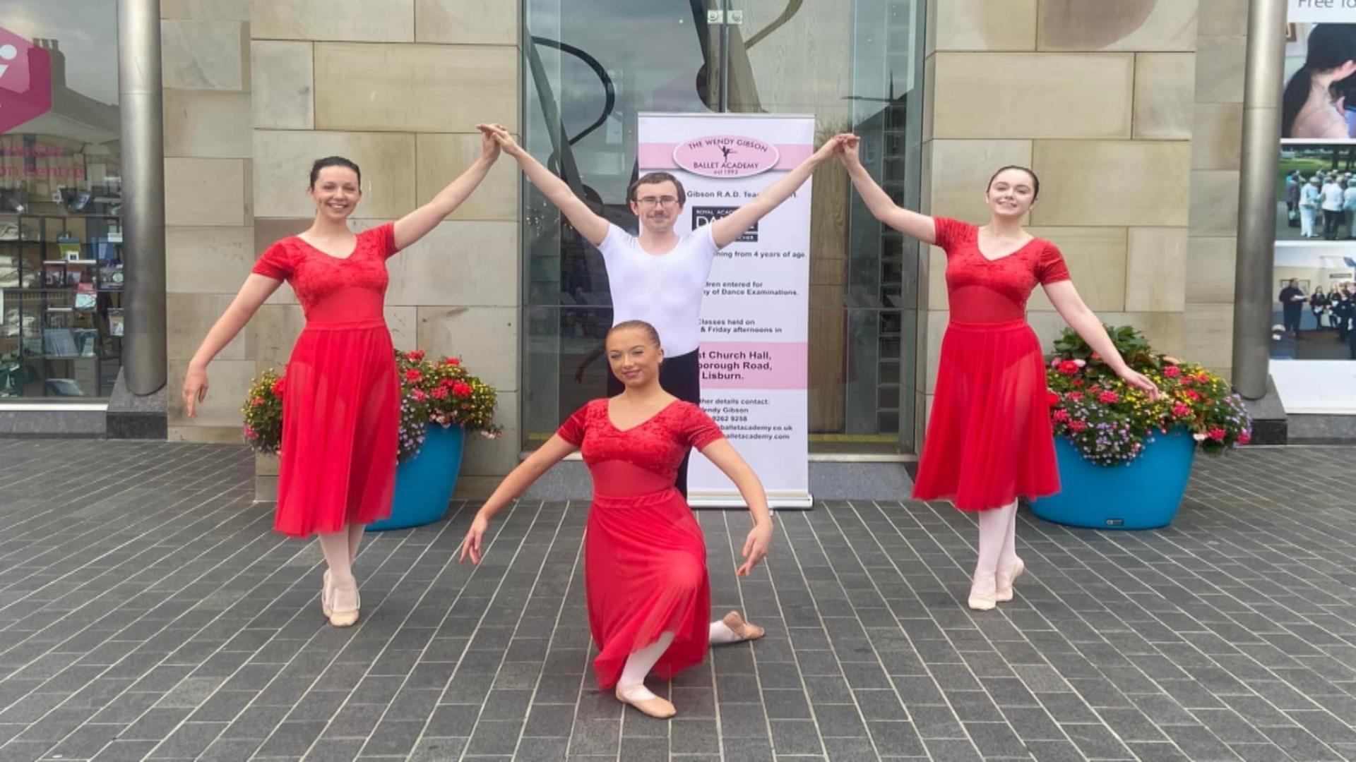 Image shows 4 members of The Wendy Gibson Ballet Academy at the front of the Lisburn Visitor Information Centre, Market Square Lisburn.