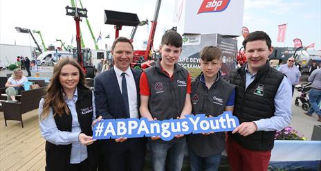 Group holding a sign saying #ABPAngusYouth