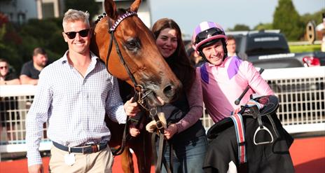Picture of horse with owner and rider