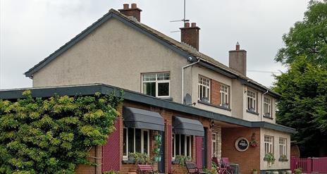 Image shows front of the property from side view