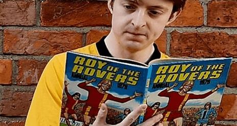 Picture of a man reading a book
