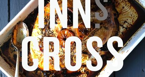 An image of the Inns Cross in words across an image of food