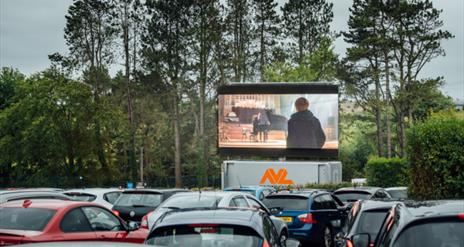 Cars at drive-in cinema at Let's Go Hydro