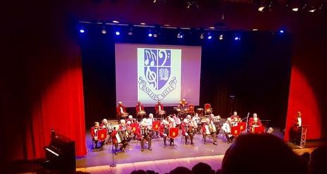 Image of band on stage in Island Hall