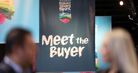 Image shows blue banner with Title Meet the Buyer and Northern Ireland Embrace a Giant Spirit