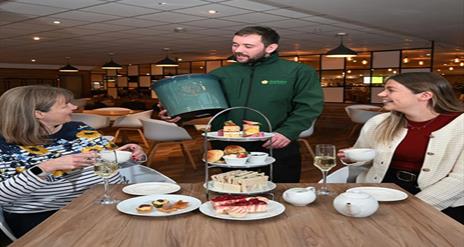 Image is of customers enjoying afternoon tea at Dobbies Lisburn