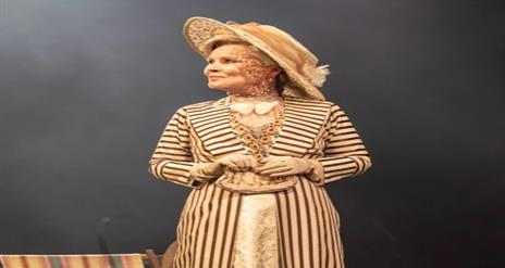 Image is of actress Imelda Staunton on stage