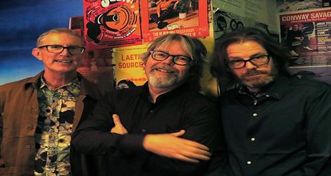 Image is of musicians The Boondocks